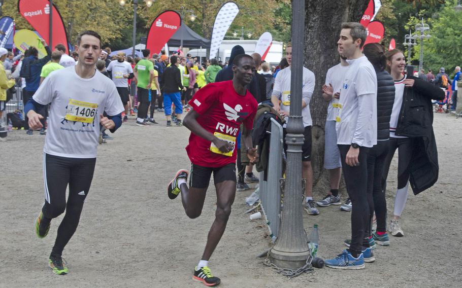 Spc. Elias Chesire of U.S. Army Garrison Wiesbaden races in the Wiesbaden 25-Stundenlauf, a 25-hour relay race held annually in downtown Wiesbaden, Sunday, Sept. 10, 2017. Chesire and 11 other USAG Wiesbaden soldiers took second place out of 11 teams in the race's competitive division.