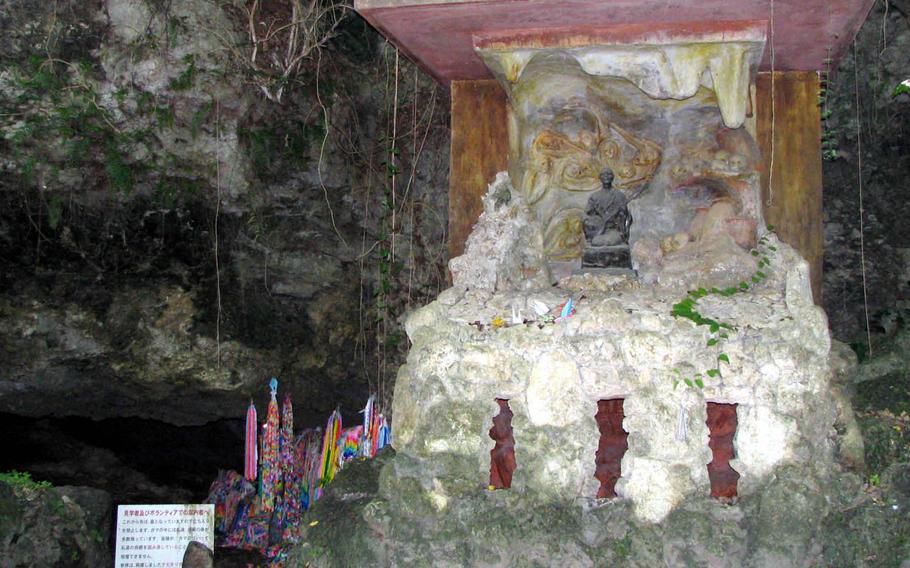 This file photo from 2007 shows the entrance to Chibichiri-gama, or "mass suicide cave," in Yomitan Village, Okinawa.