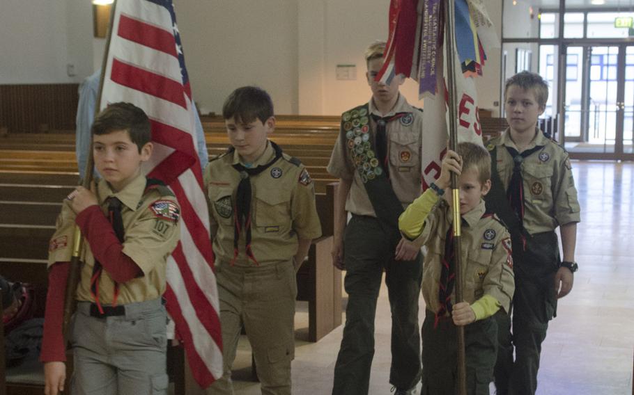 Members of the Wiesbaden Boy Scout Troop 107 color guard carry the U.S. and troop flags at the beginning of a quarterly meeting in Wiesbaden, Monday, Sept. 18, 2017. During the meeting, the troop celebreated its 60th anniversary and bade farewell to outgoing scoutmaster Jeff Stone.