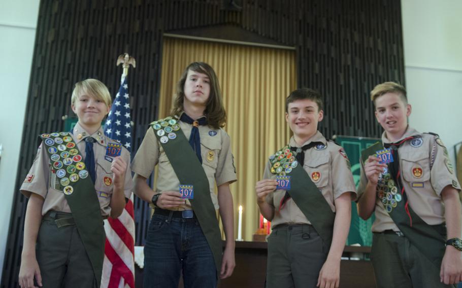 From left, Wiesbaden Boy Scout Troop 107 members Sean Marshall, Ethan Vigue, Spenser Hudson and Cody Bloxom show off the new troop patch during 60th anniversary celebrations in Wiesbaden, Monday, Sept. 18, 2017. The patch uses the same color scheme as the flag of Hessen, the German state where the troop is located.