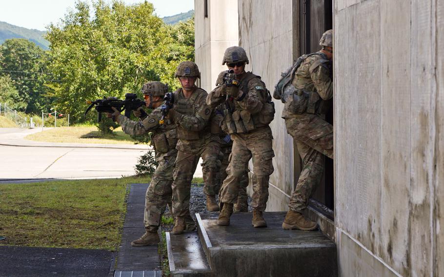 Soldiers with the Army's 1st Brigade Combat Team, 25th Infantry Division take part in urban combat training during Orient Shield drills at East Fuji Maneuver Area, Japan, Monday, Sept. 18, 2017.