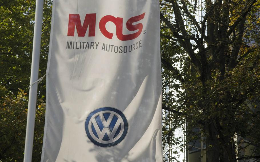 A banner outside the Military AutoSource location in Wiesbaden, Germany advertises Volkswagens, Thursday, Sept. 21, 2017.