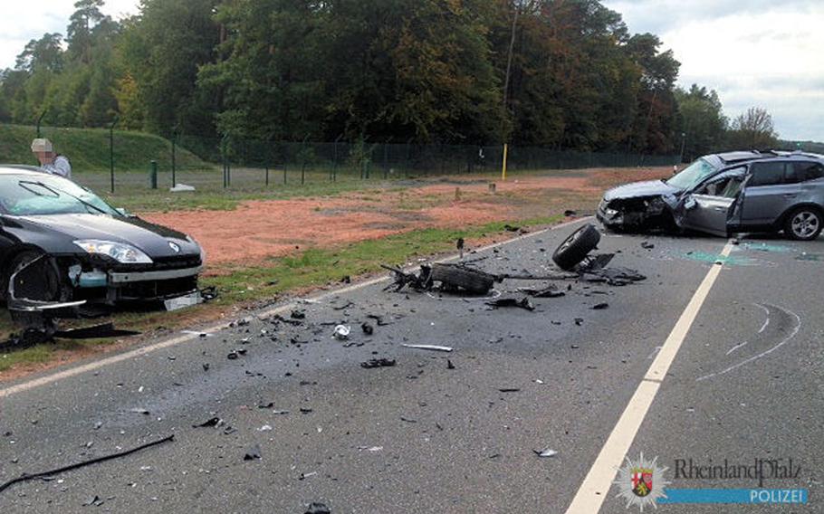 The damage to two cars involved in a crash outside the East Gate of Ramstein Air Base, Germany, on Wednesday, Oct. 4, 2017, can be seen in this photo provided by Kaiserslautern police. The spouse of an Air Force civilian was seriously injured in the wreck.