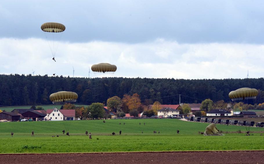 French Foreign Legion and British paratroopers land in a drop zone outside Hohenfels, Germany, during Exercise Swift Response, Oct. 9, 2017.