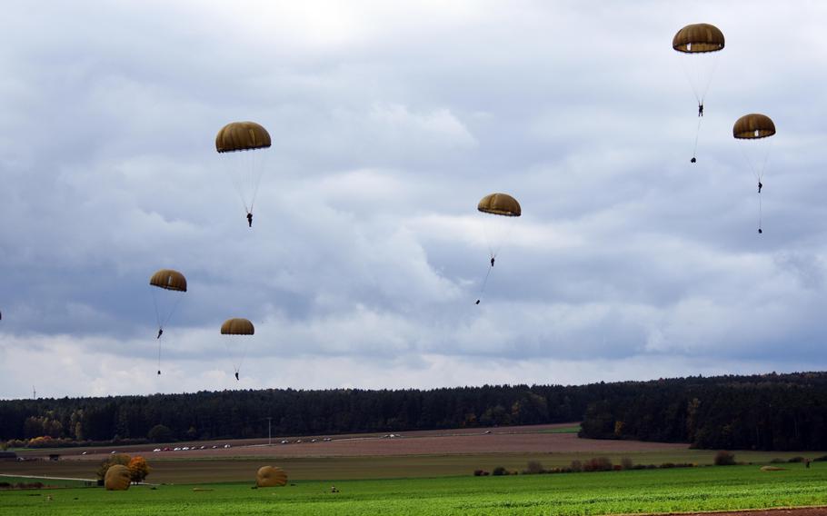 French Foreign Legion and British paratroopers land in a drop zone outside Hohenfels, Germany, during Exercise Swift Response, Oct. 9, 2017.