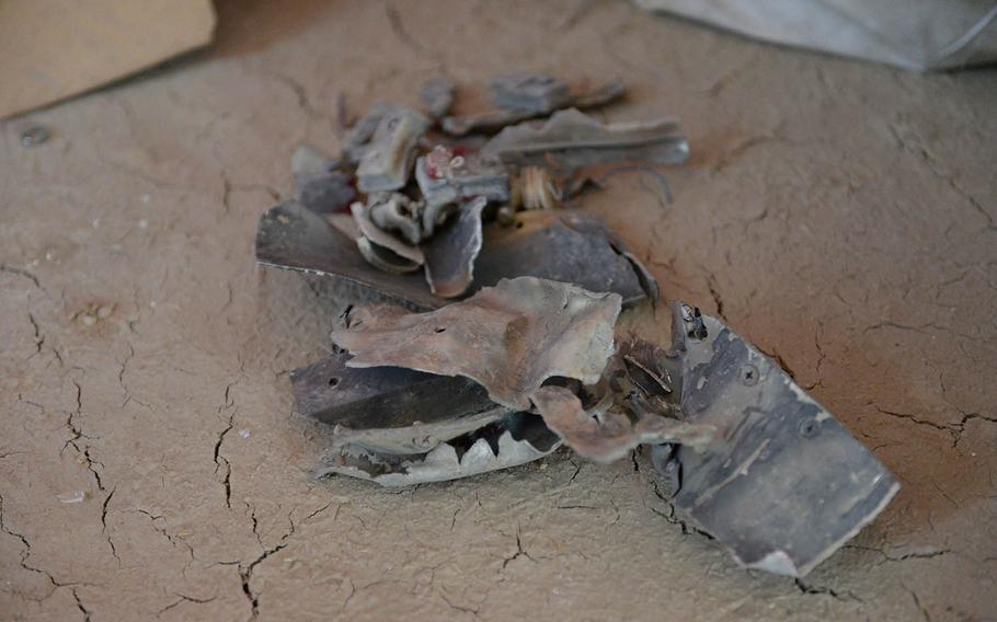 Metal scraps an Afghan family says are part of a U.S. missile that destroyed their house sit in a corner on Oct. 8, 2017.