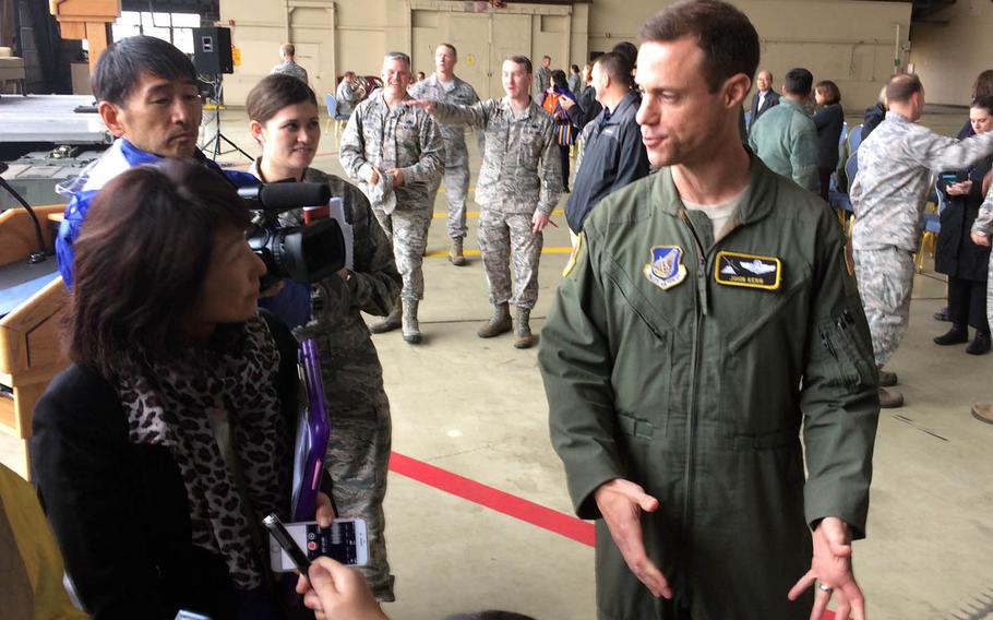 Lt. Col. John Kerr speaks to reporters shortly before taking the controls of the last Japan-based C-130H Hercules cargo plane for a flight to Montana, Monday, Oct. 17, 2017.