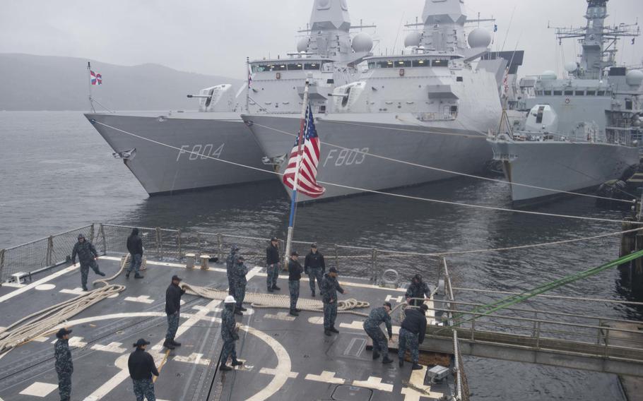 Sailors raise the bow of the Arleigh Burke-class guided-missile destroyer USS Winston S. Churchill during exercise Formidable Shield 2017 in Faslane, Scotland, Oct. 1, 2017.