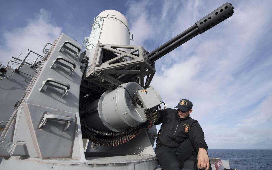 Fire Controlman 2nd Class Steven Tarver loads the Phalanx close-in weapons system aboard the Arleigh Burke-class guided-missile destroyer USS Winston S. Churchill during exercise Formidable Shield 2017 in the Atlantic Ocean, Sept. 25, 2017.