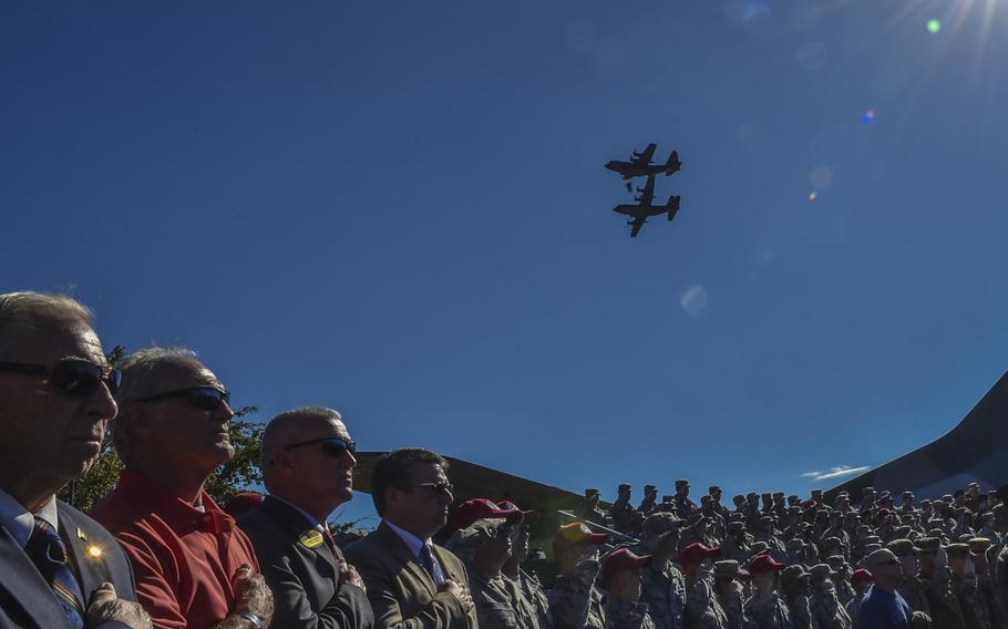 Two AC-130U Spooky Gunships perform a flyover during a combined medal ceremony at Hurlburt Field, Fla., Tuesday, Oct. 17, 2017. Secretary of the Air Force Heather Wilson awarded 10 Air Force Special Operations Command air commandos valorous medals, including the Air Force Cross, for their efforts during a fierce firefight near the city of Kunduz, Afghanistan on Nov. 2, 2016.