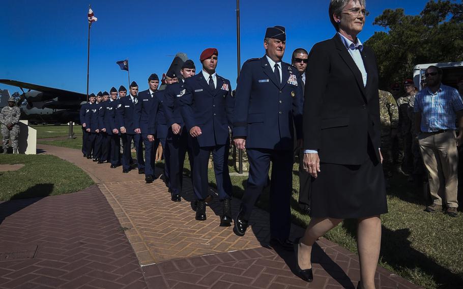 Secretary of the Air Force, Heather Wilson, leads the official party during a combined medal ceremony at Hurlburt Field, Fla., Tuesday, Oct. 17, 2017.