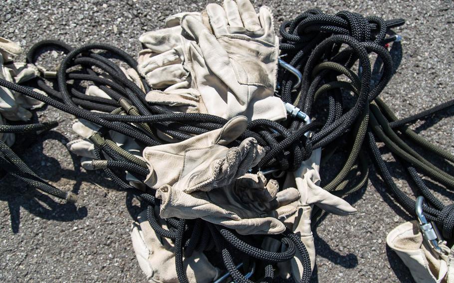 Gloves and ropes -- tools of the air-assault trade -- are piled up at Camp Mobile, South Korea, Thrusday, Oct. 19, 2017.
