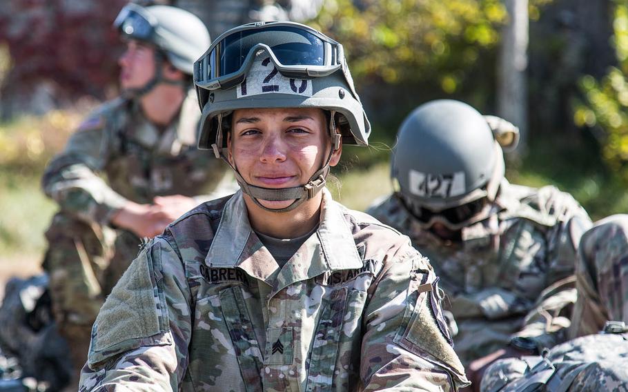 An air-assault student takes a breather after rappelling out of a helicopter at Camp Mobile, South Korea, Thursday, Oct. 19, 2017.