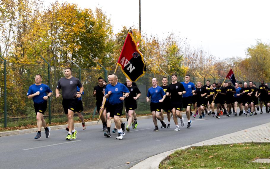 Soldiers with Task Force Falcon, 10th Combat Aviation Brigade, run as part of the brigade's "world run" event in Illesheim, Germany, on Friday, Oct. 20, 2017. Brigade soldiers ran simultaneously in 14 locations spanning the United States, Europe, the Middle East and South Korea.