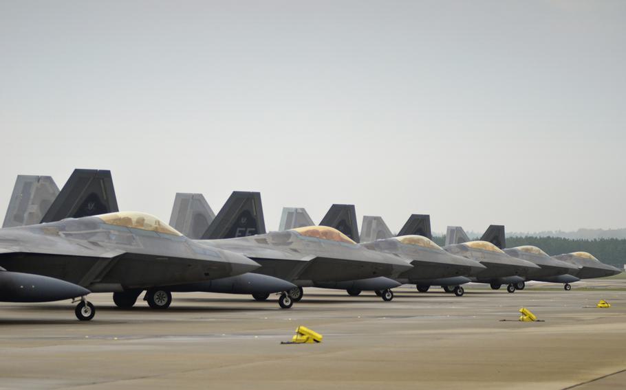 U.S. Air Force F-22 Raptors of the 1st Fighter Wing before take-off at RAF Lakenheath, England, Thursday, October 19, 2017. The stealth fighter jets arrived earlier this month for training missions in the European theater as part of the European Deterrence Initiative