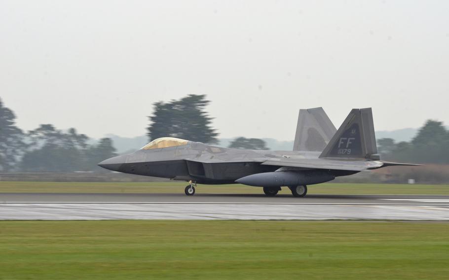 A U.S. Air Force F-22 Raptor of the 1st Fighter Wing takes off from at RAF Lakenheath, England, Thursday, October 19, 2017. Six of the stealth fighter jets arrived earlier this month for training missions in the European theater.