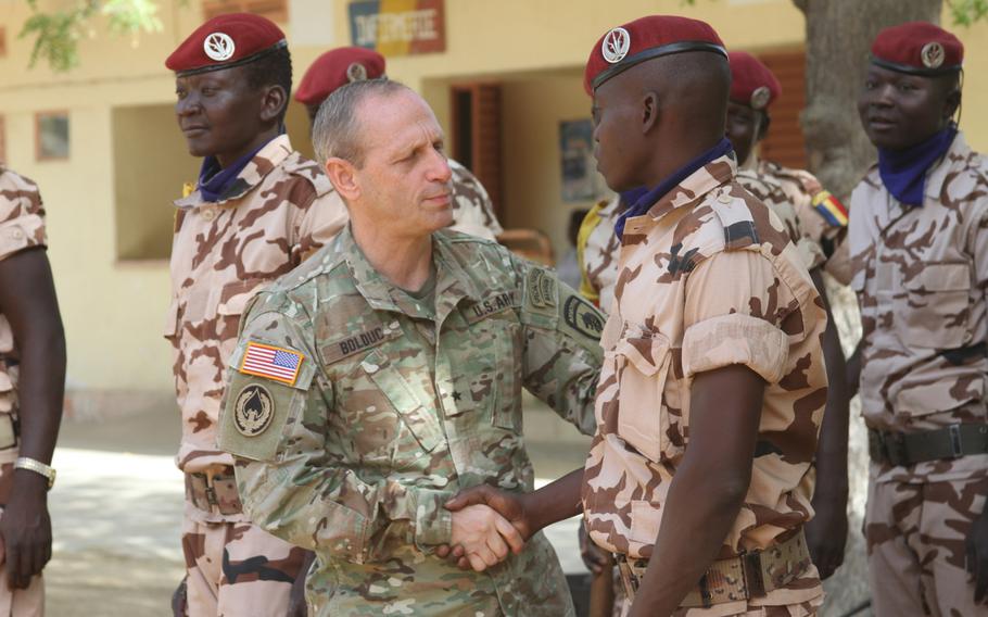 Brig. Gen. Donald Bolduc, then-commander of Special Operations Command Africa, greets Chadian personnel participating in the Flintlock 2017 closing ceremony on March 16, 2017 in N'Djamena, Chad.