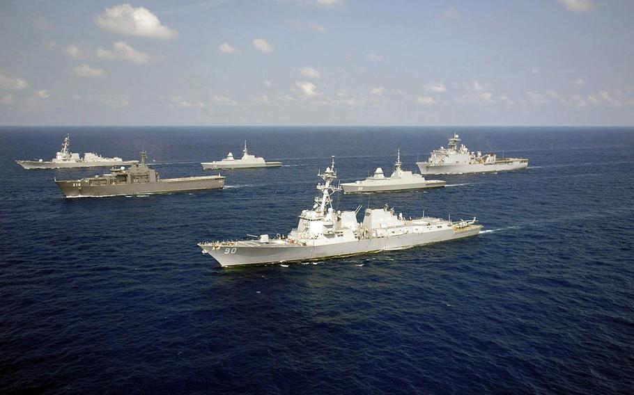The guided-missile destroyer USS Chafee, foreground, sails with the USS Chung-Hoon and Singapore navy ships during past Cooperation Afloat Readiness and Training in the South China Sea.