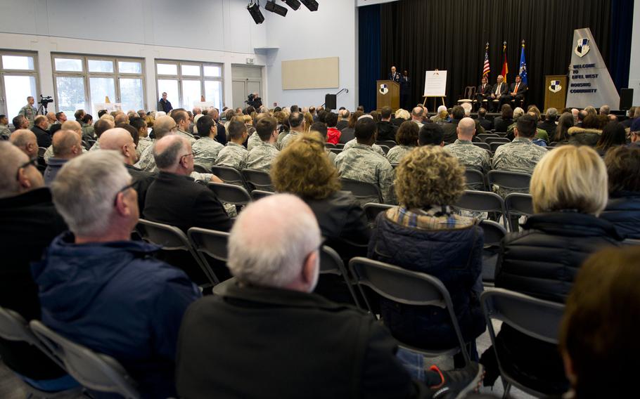 Attendees listen to speakers during a ceremony to turn over the Bitburg Annex housing area to the German government in Bitburg, Germany, on Monday, Nov. 6, 2017.