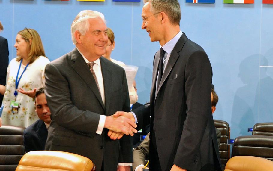 U.S. Secretary of State Rex Tillerson shakes hands with NATO Secretary General Jens Stoltenberg before the NATO Foreign Ministerial in Brussels, Belgium, on March 31, 2017. Tillerson will meet Tuesday with allies in Brussels.