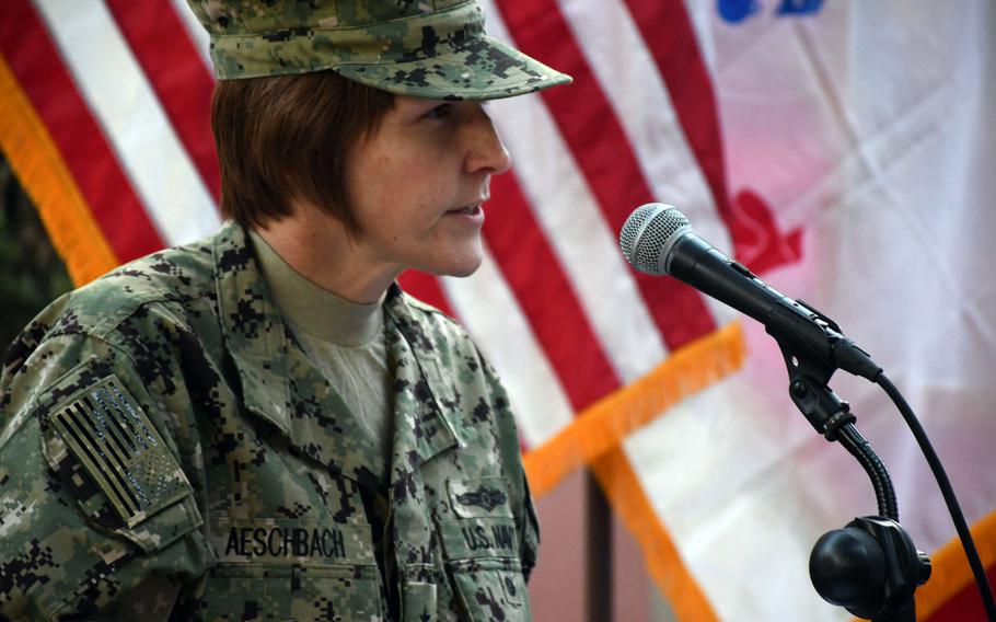 Navy Rear Adm. Kelly Aeschbach, U.S. Forces Afghanistan deputy director of intelligence, speaks at a ceremony at NATO's Resolute Support headquarters in Kabul on Thursday, Dec. 7, 2017, to mark the 76th anniversary of the attack on Pearl Harbor.