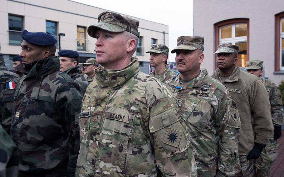 California National Guardsmen with the 40th Infantry Division stand beside French Rapid Reaction Corps soldiers during the opening ceremony for the Citadel Bonus mission in Bydgoszcz, Poland on Thursday, Dec. 4, 2017.
