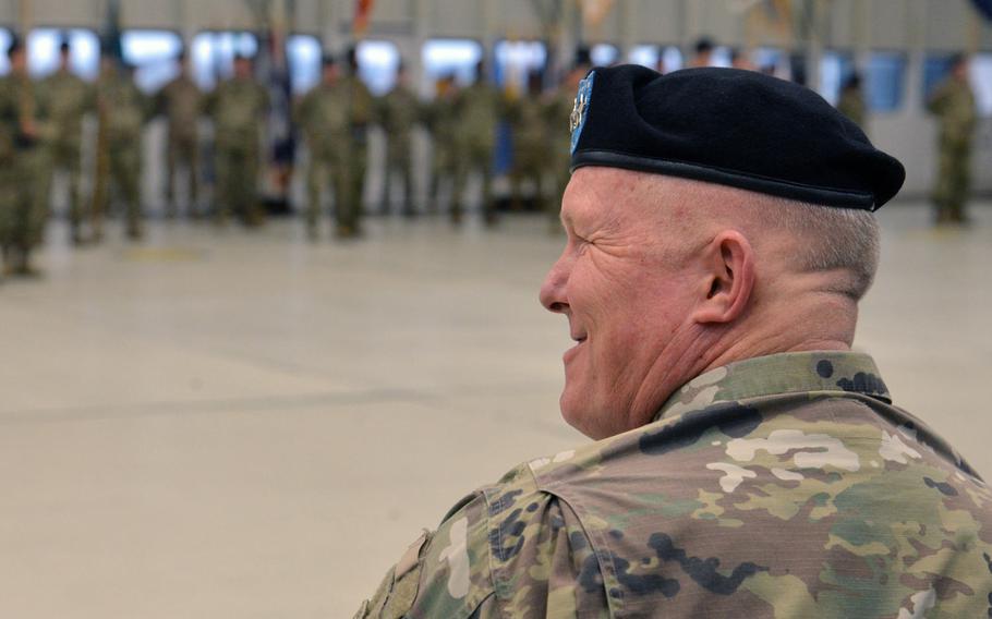 The acting commanding general of U.S. Army Europe, Maj. Gen. Tim McGuire, smiles during the relinquishment of command and retirement ceremony for outgoing USAREUR commander Lt. Gen. Ben Hodges at Clay Kaserne in Wiesbaden, Germany, Friday, Dec. 15, 2017.