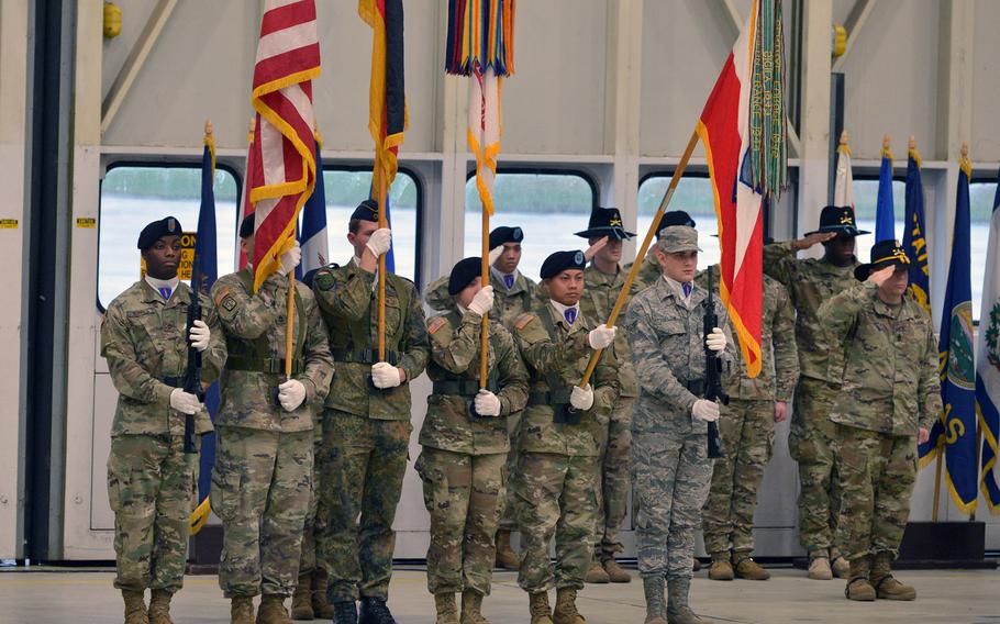 The honor guard during the playing of the national anthems of Germany and the United States at the relinquishment of command and retirement ceremony for outgoing USAREUR commander Lt. Gen. Ben Hodges at Clay Kaserne in Wiesbaden, Germany, Friday, Dec. 15, 2017.