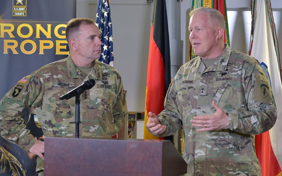 The outgoing commander of U.S. Army Europe Lt. Gen. Ben Hodges, left, listens as Maj. Gen. Tim McGuire, the acting commander, answers a journalists question at a press conference before the relinquishment of command and retirement ceremony for Hodges at Clay Kaserne in Wiesbaden, Germany, Friday, Dec. 15, 2017. A a permanent replacement for Hodges has not yet been named.