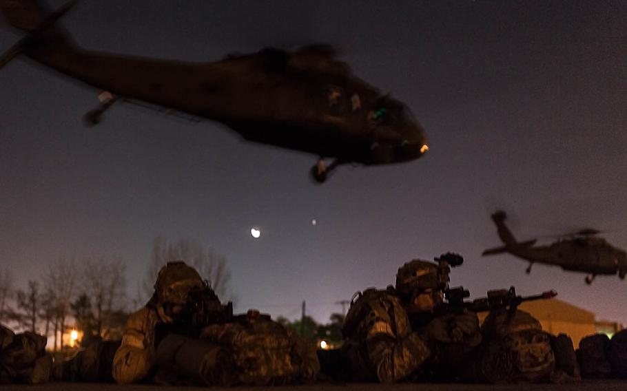Soldiers with 1st Battalion, 5th Cavalry Regiment air-assault into Camp Stanley, South Korea, Friday, Dec. 15, 2017.