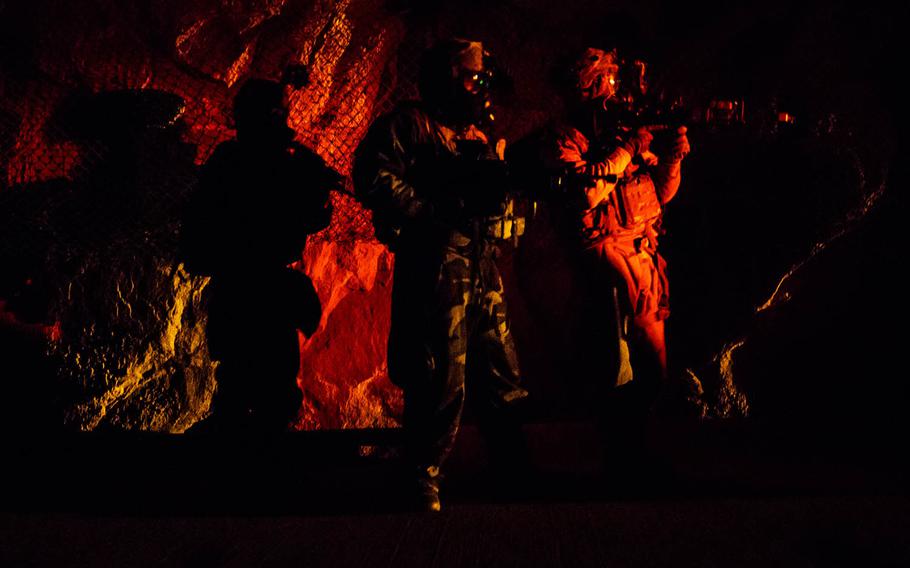 Soldiers from 1st Battalion, 5th Cavalry Regiment manuever through the underground facility at Camp Stanley, South Korea, Friday, Dec. 15, 2017.
