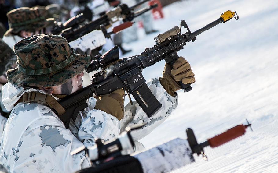 U.S and South Korean Marines demonstrate their rifle skills at Pyeongchang, South Korea, Tuesday, Dec. 19, 2017.