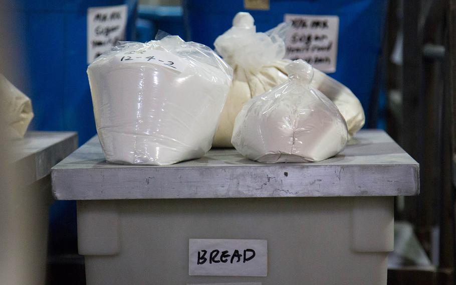 Bread ingredients sit ready to be baked at the Army and Air Force Exchange Service bakery at Camp Market, South Korea, Tuesday Dec. 5, 2017.