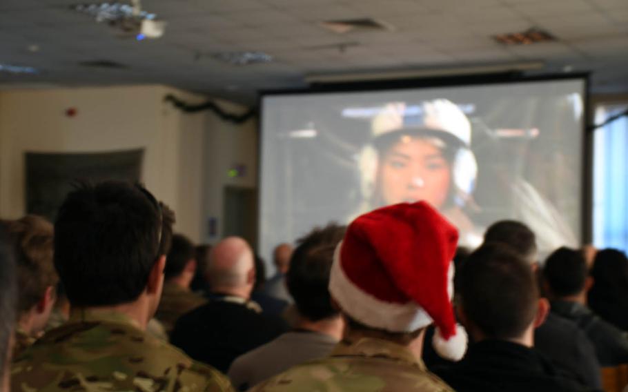 Troops watch an afternoon screening of "Star Wars: The Last Jedi" at a coalition base at Hamid Karzai International Airport in Kabul, Afghanistan, on Saturday, Dec. 23, 2017.