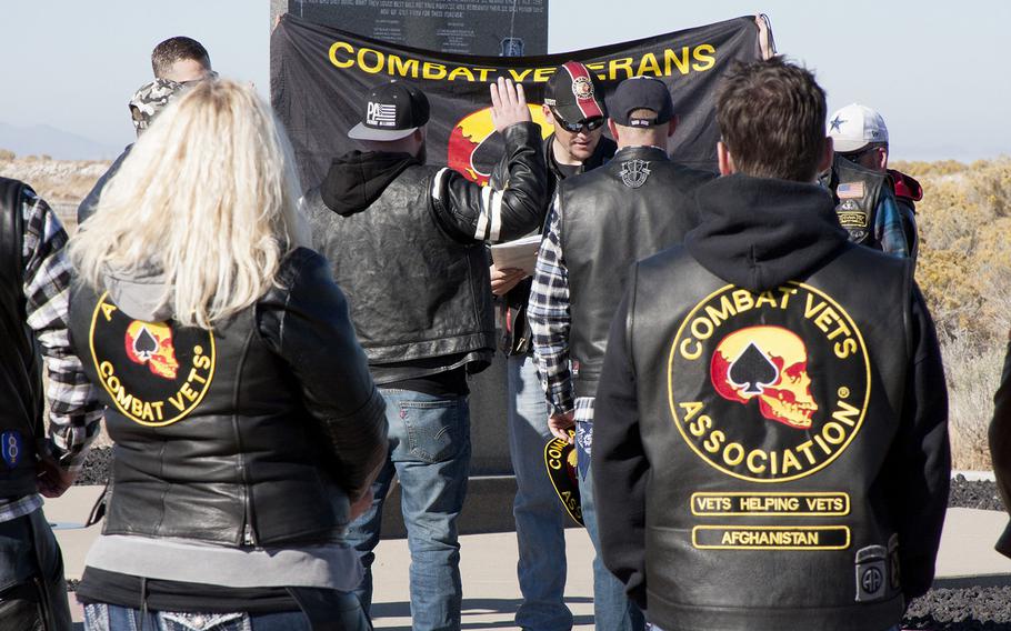 A Utah chapter of the Combat Veterans Motorcycle Association swears in a new member Saturday, Oct. 28 at Antelope Island State Park, where they awarded the National Center for Veterans Studies $35,000 to fund suicide-prevention research.