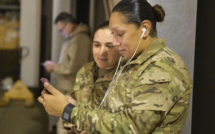 Sgt. Vanessa Turner chats with her 4-year-old son via a smartphone video calling app at a coalition base at the international airport in Irbil, Iraq, on Sunday, Dec. 25, 2016.