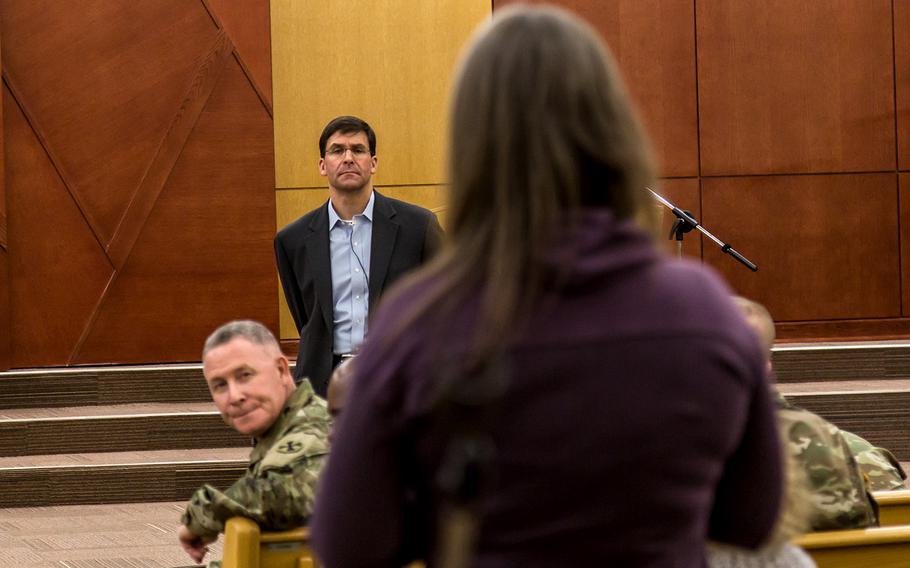 Secretary of the Army Mark Esper and 8th Army commander Lt. Gen. Michael Bills listen to a question from a civilian at Camp Humphreys, South Korea, Tuesday, Jan. 9, 2018.