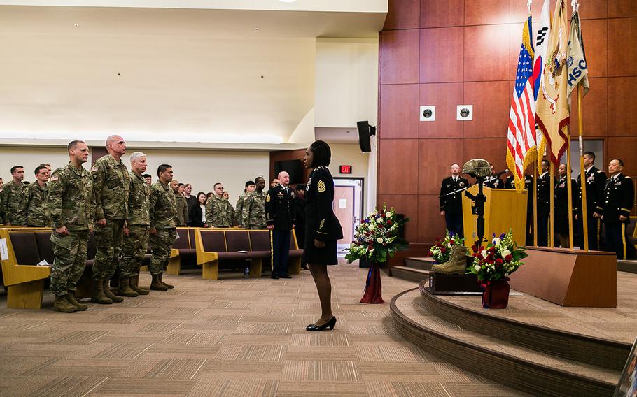 1st Sgt. Devon Legare calls Staff Sgt. Kyle LeFlore a final time during a ceremonial final roll call at Camp Humphreys, South Korea, Thursday, Jan. 11, 2018.