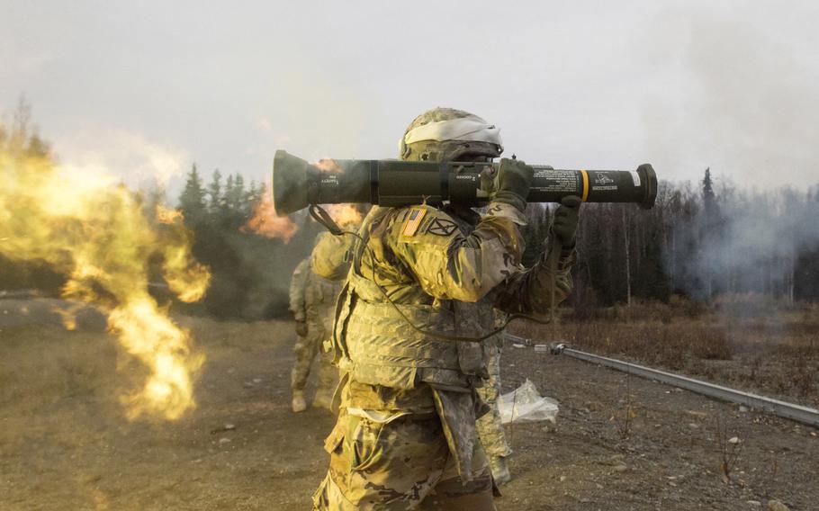 A soldier handles an AT-4 light anti-armor weapon during live-fire training at Joint Base Elmendorf-Richardson, Alaska, Oct. 12, 2017.