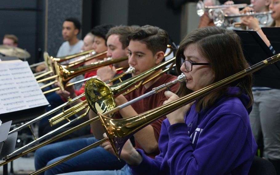 Melody Morrise, right, and the rest of the big band trombone section rehearse a number at this year's DODEA-Europe jazz seminar in Ramstein, Germany, Tuesday, Jan. 16, 2018.