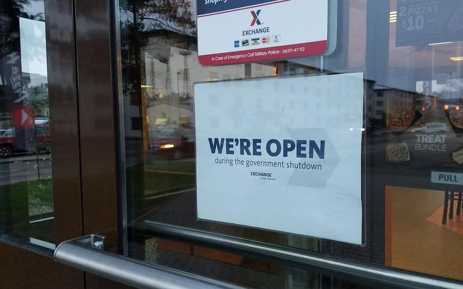 A fast food location at Ramstein Air Base in Germany lets customers know they're open on Monday, Jan. 22, 2018, despite the federal  government shutdown. The shutdown has delayed or cancelled some services at overseas military bases.