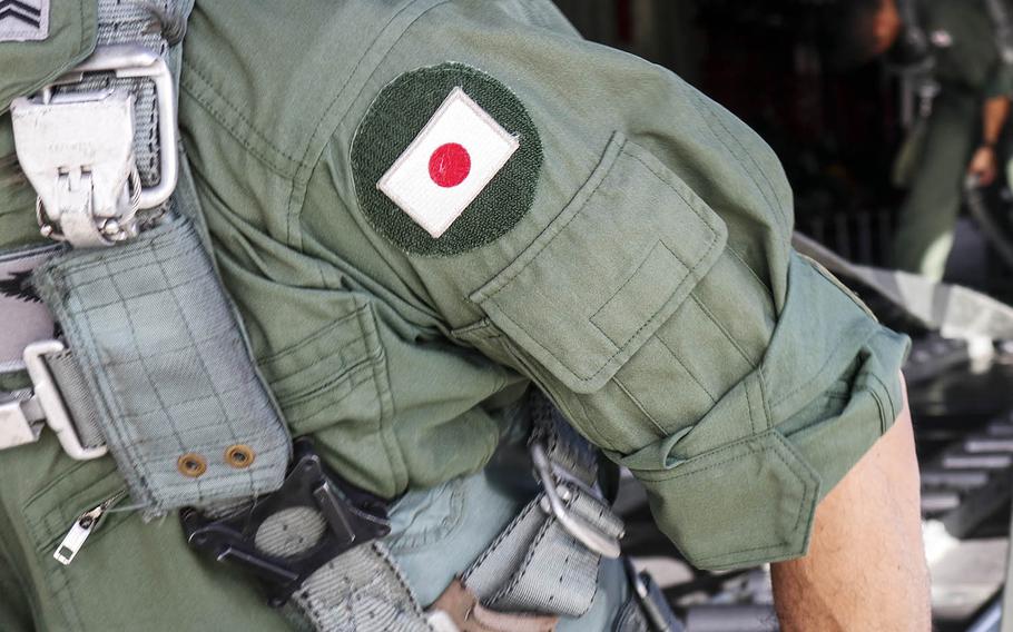 A member of the Japan Air Self-Defense Force prepares for a mission at Andersen Air Force Base, Guam, in December.