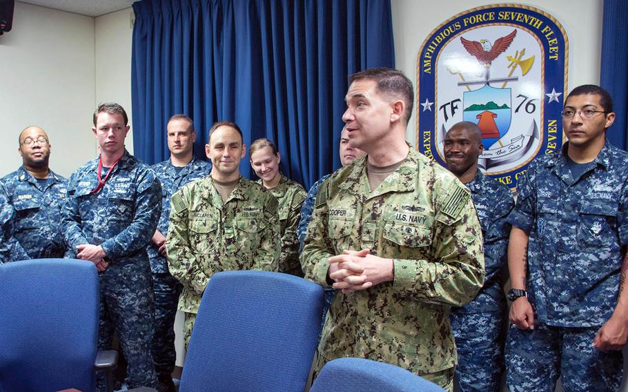 Rear Adm. Brad Cooper took command of Task Force 76 in Okinawa, Japan, Monday, Jan. 22, 2018.