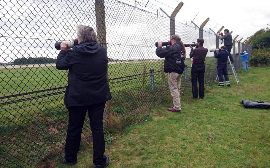 Aviation enthusiasts take photographs of an RAF Tornado taking off from RAF Lakenheath, England, near the base's viewing area, Oct. 3, 2017. People have legally taken footage of military operations in the United Kingdom from outside base fence lines since the 1950s.