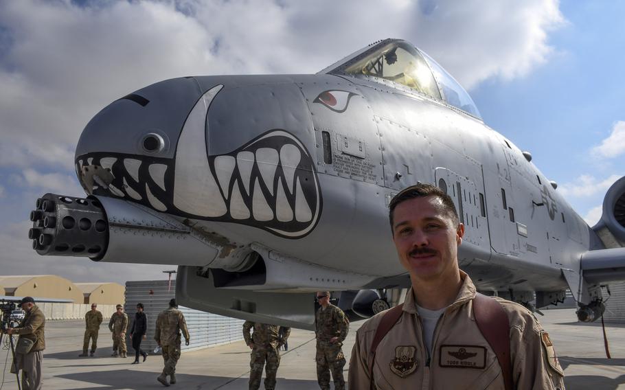 Lt. Col. Todd "Riddler" Riddle, of the Whiteman, Mo.-based 303d Expeditionary Fighter Squadron, is pictured here in front of his A-10 ''Warthog'' Thunderbolt II, which he flew through a hail storm over Afghanistan in 2008, during a press event at Kandahar Air Field on Tuesday, Jan. 23, 2018.