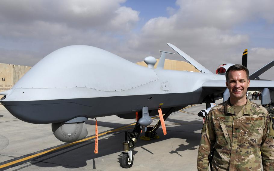 Col. Stephen ''Joker'' Jones stands in front of an MQ-9 Reaper remotely piloted aircraft during a press event at Kandahar Air Field, Afghanistan, on Tuesday, Jan. 23, 2018. Jones, commander of the 451st Air Expeditionary Group at the base, began flying unarmed Predator drones in 2000 and flew missions over Kandahar in the early days of the Afghan war.