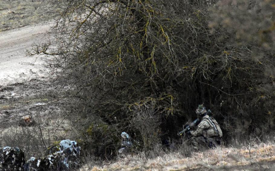 A soldier, armed with an AT-4, is set up to ambush the mock enemy during the Allied Spirit VIII exercise in Hohenfels, Germany, Monday, Jan. 29, 2018.