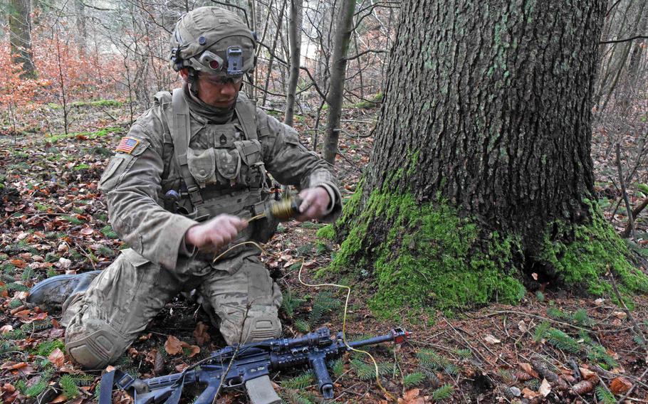 Sgt. 1st Class Levi Osler prepares a training Claymore Mine during the Allied Spirit VIII exercise at Hohenfels, Germany, Monday, Jan. 29.