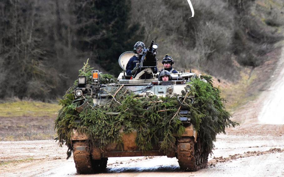 The enemy forces, in a training scenario, drive a modified M113-A3 vehicle to simulate a BMP armored personnel carrier during the Allied Spirit VIII exercise in Hohenfels, Germany, Monday, Jan. 29, 2018.