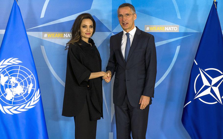Angelina Jolie, UN High Commissioner for Refugees Special Envoy, with NATO Secretary General Jens Stoltenberg at NATO headquarters in Brussels on Wednesday, Jan. 31, 2018.